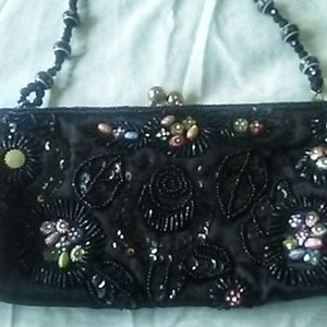 VINTAGE BLACK SATIIN WITH BEAUTIFUL DESIGNS